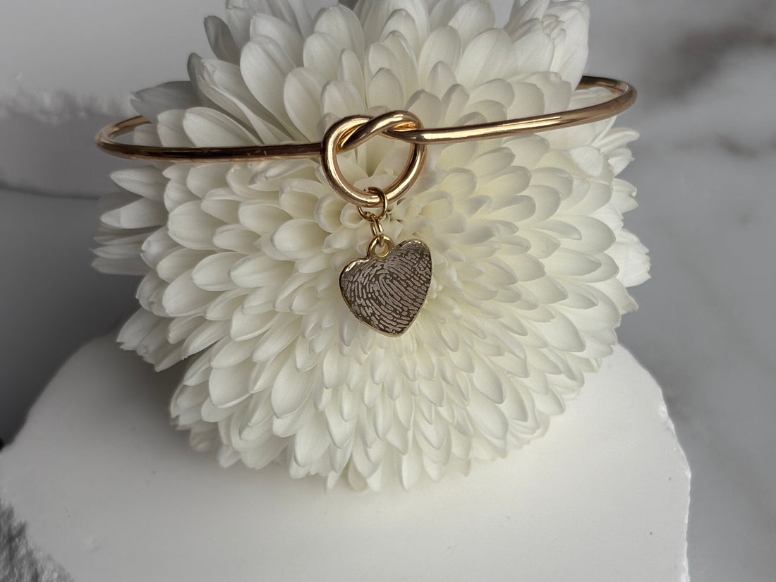 Fingerprints on my heart bracelet